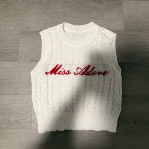 White Cable Knit Sweater Vest with Red Text